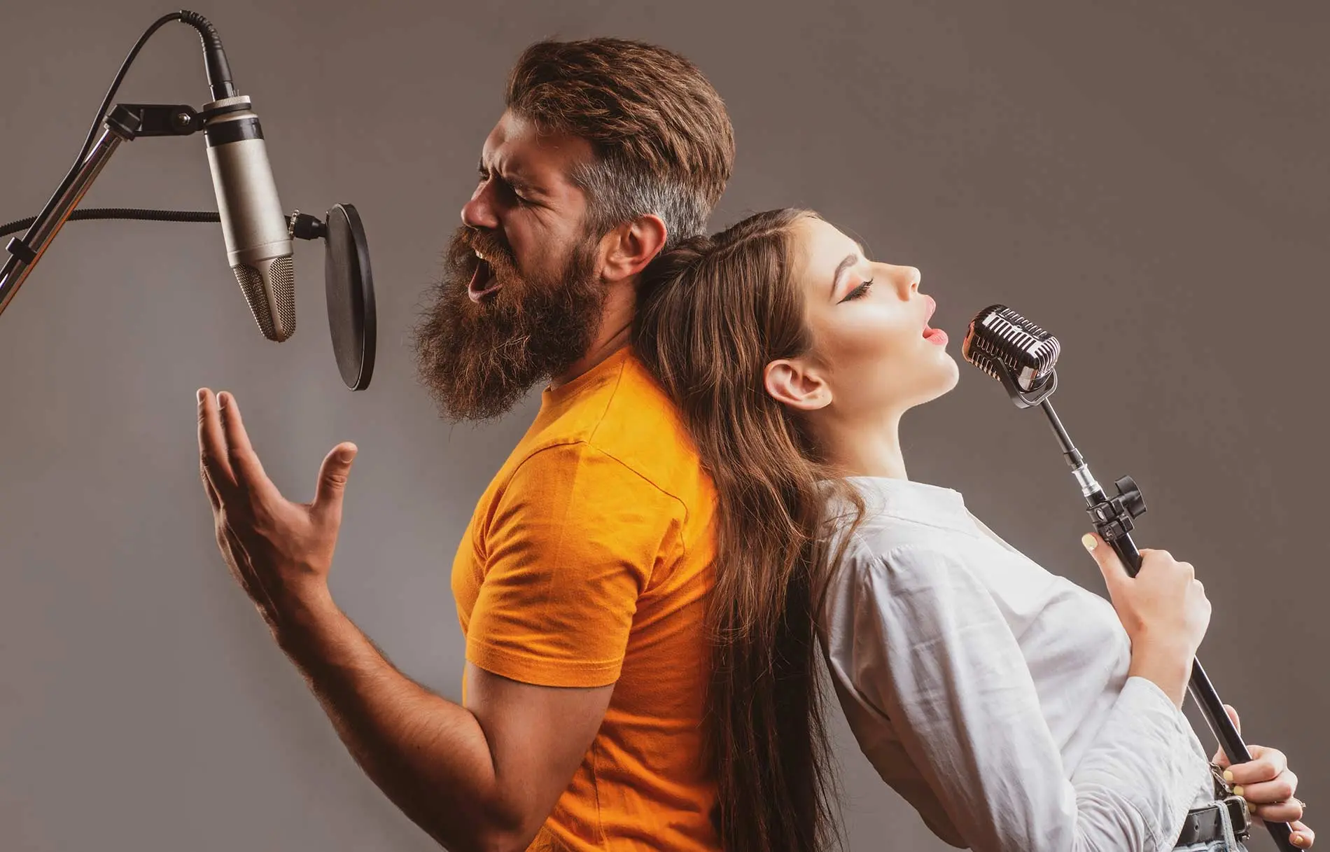 A man and a woman singing together