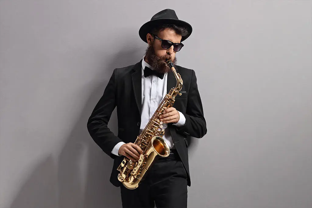 A man playing saxophone