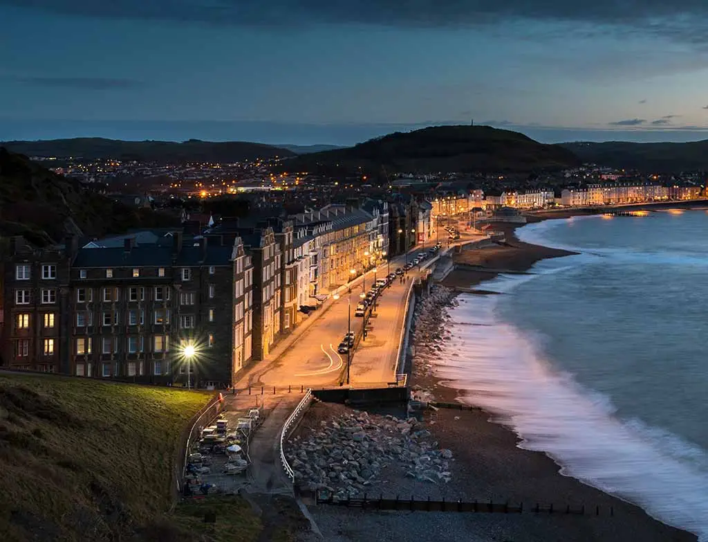 Aberystwyth promenade and seafront lit at dusk