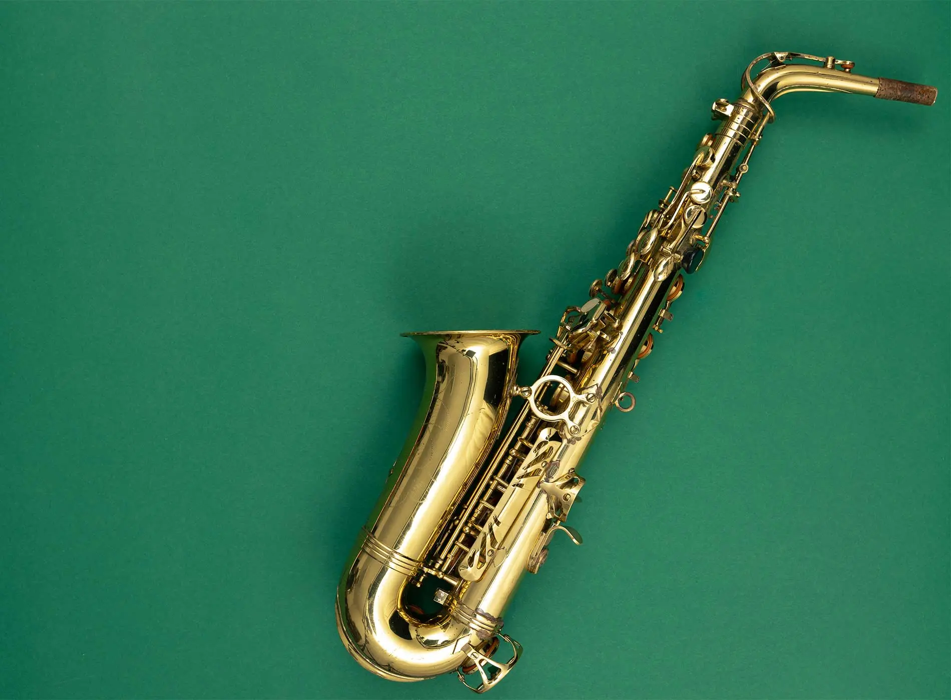 Saxophone with green background