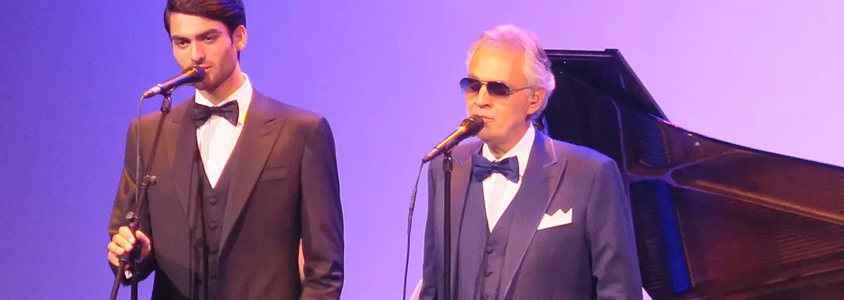 Andrea Bocelli singing with his son