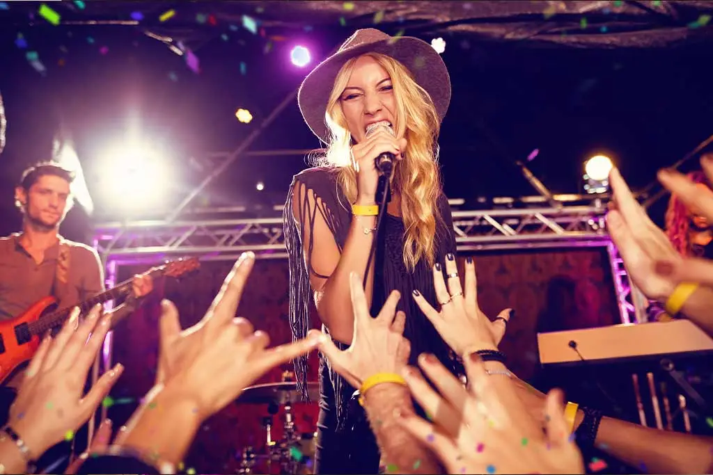 Band performing with audience