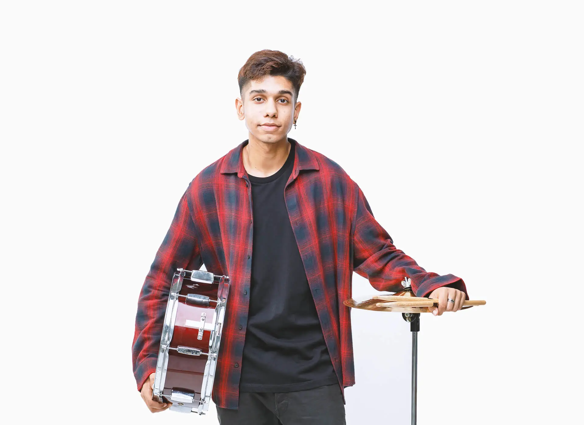 Boy standing with snare drum