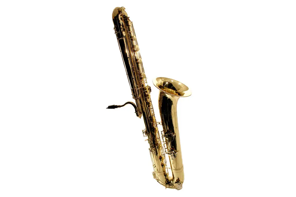 Gold contrabass saxophone on a white background
