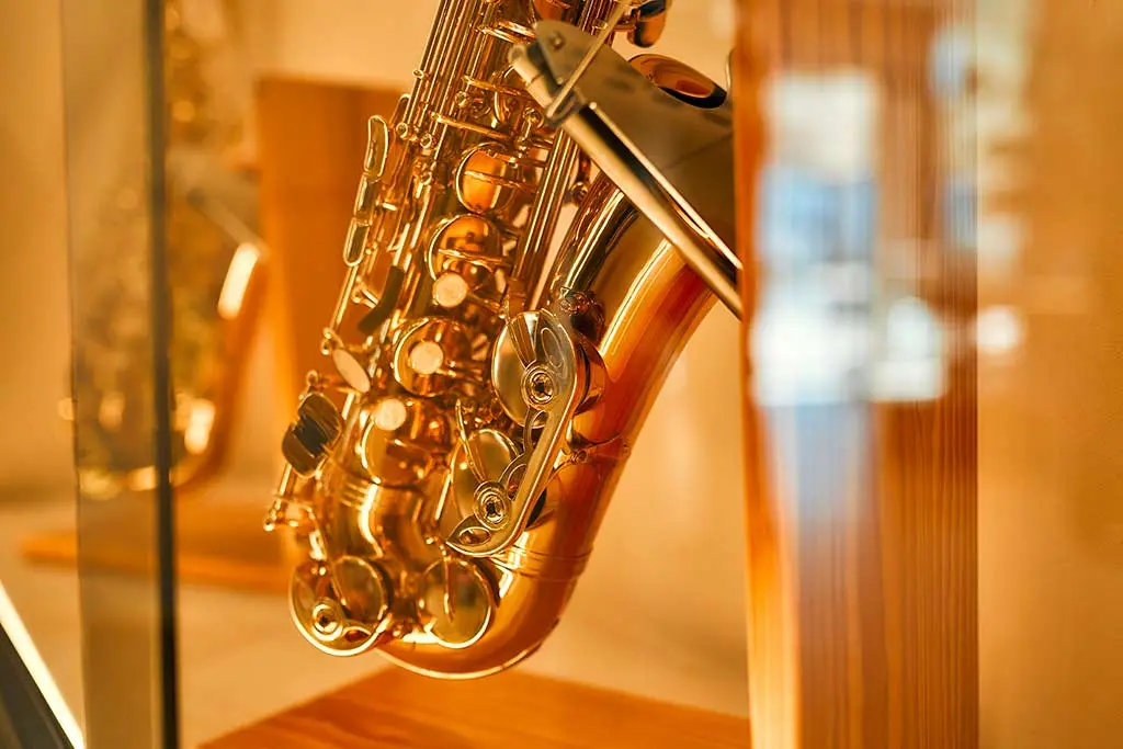 Close-up of a hanging saxophone
