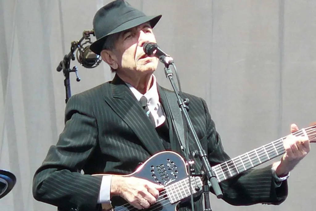 Image of Leonard Cohen performing