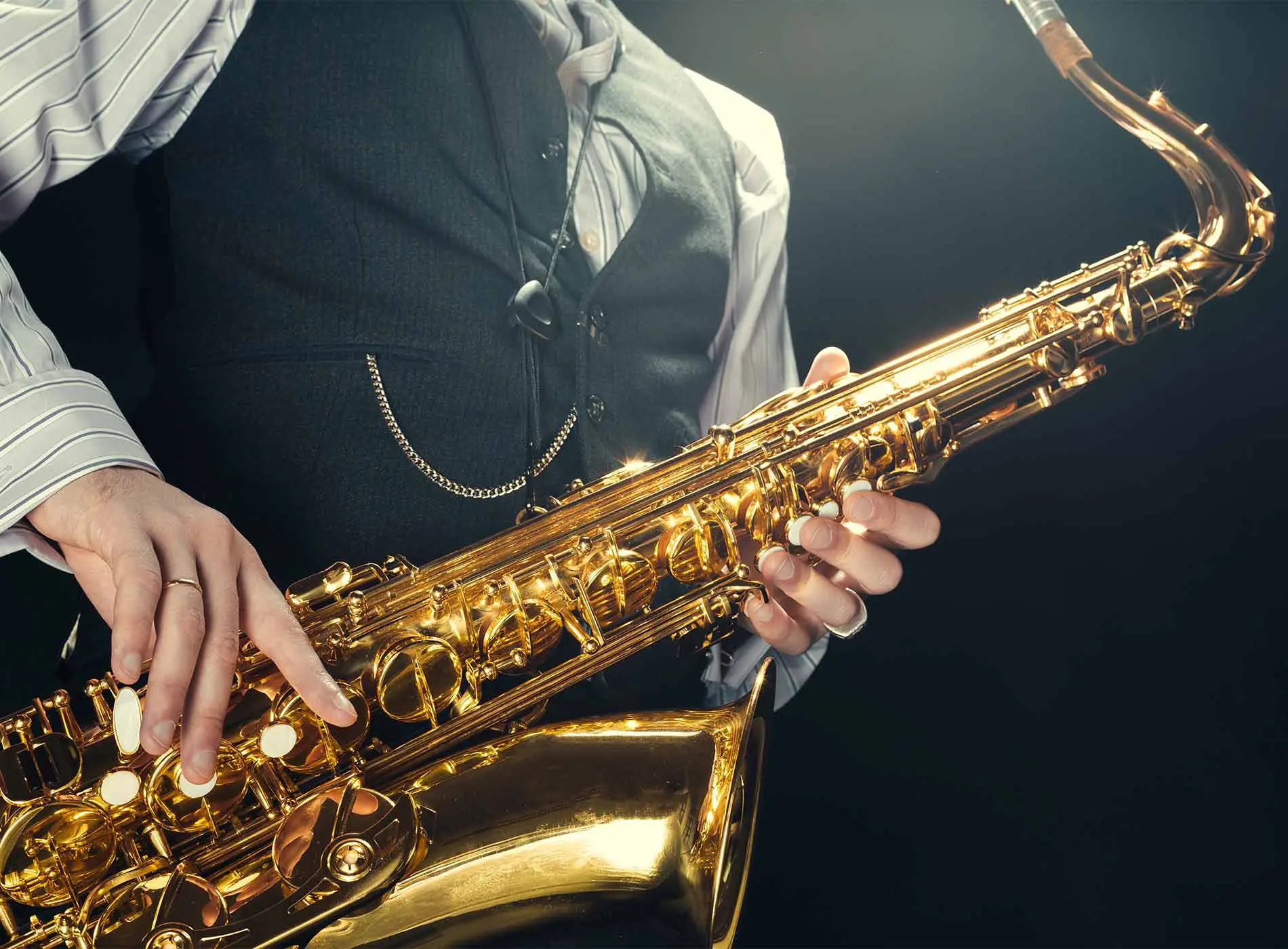 Man holding a saxophone