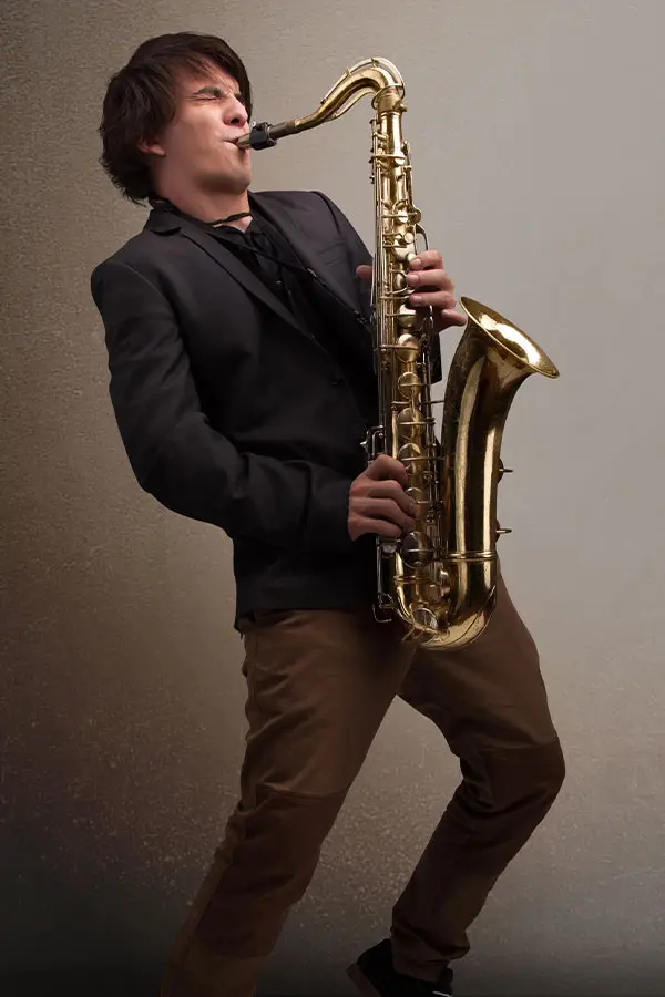 Man passionately playing saxophone