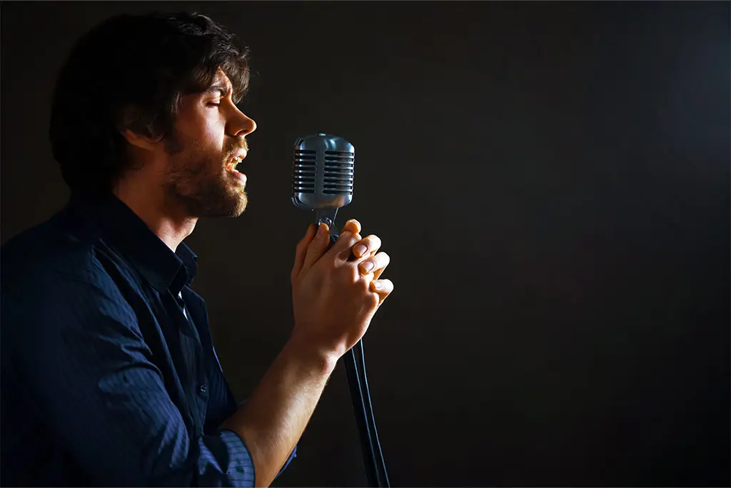 Man singing passionately
