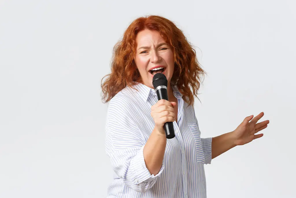 Middle aged woman singing