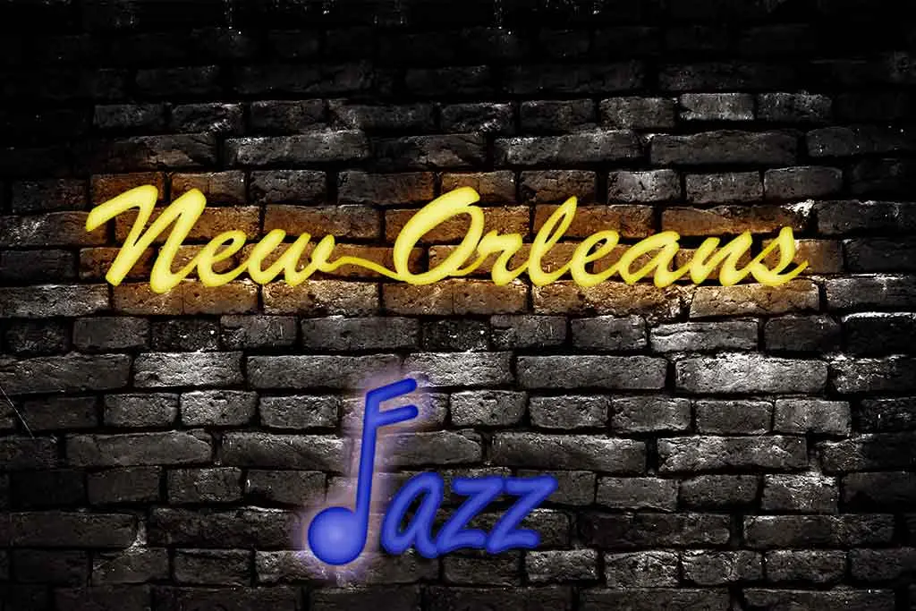 Neon New Orleans jazz sign on a brick wall