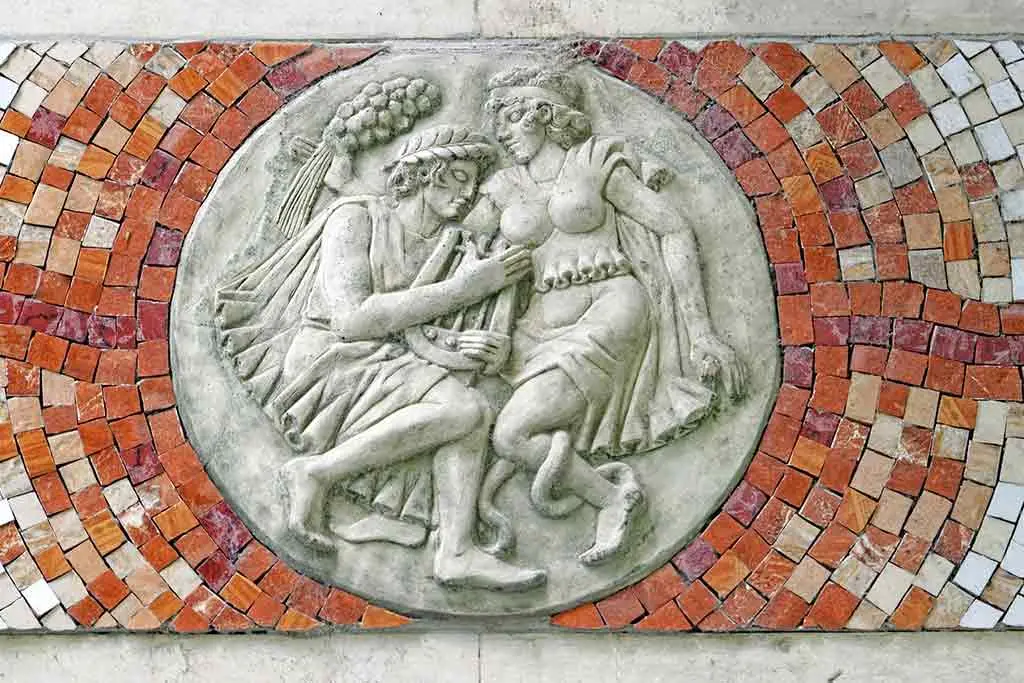 Mosaic relief of Orpheus holding a lyre beside Eurydice