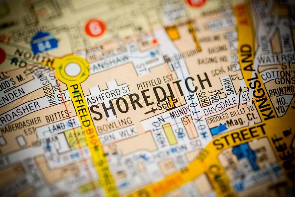 Close-up of a printed street map showing Shoreditch