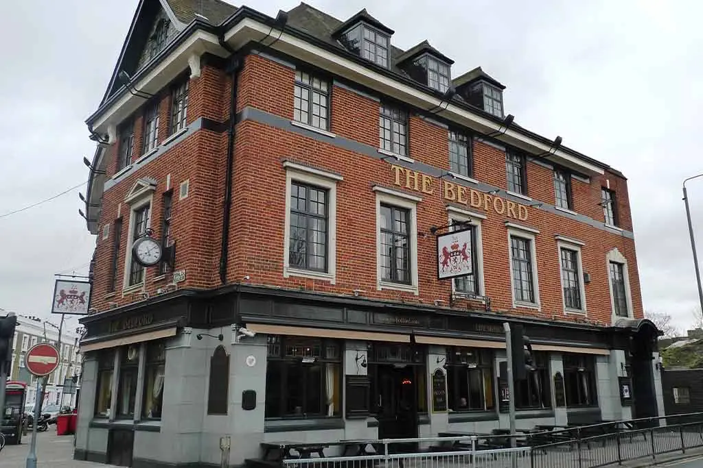 Closer view of The Bedford pub exterior on a corner
