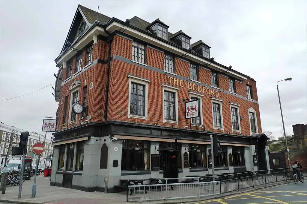 The Bedford pub exterior with yellow road markings