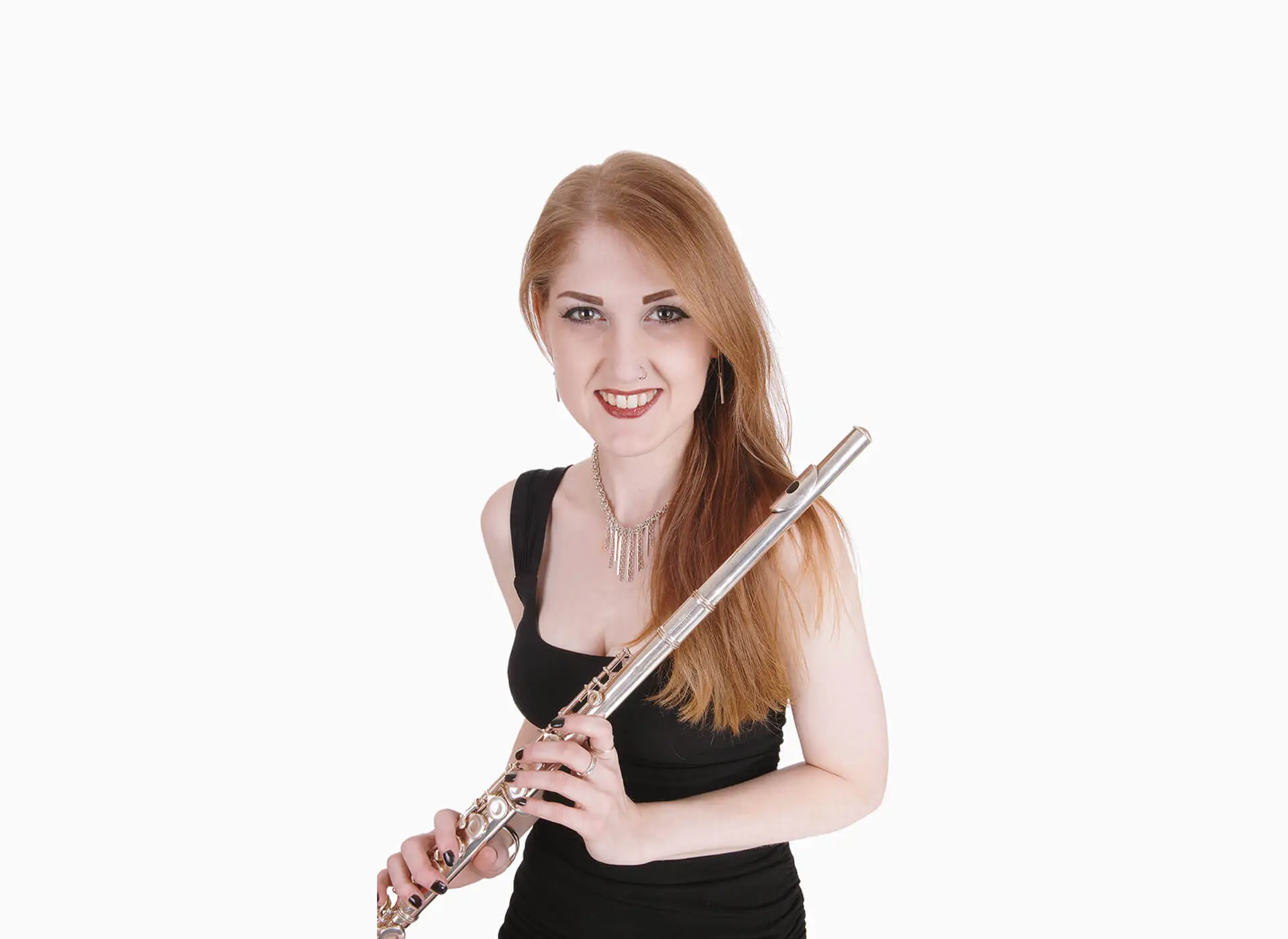 Smiling woman holding a silver flute in a black dress