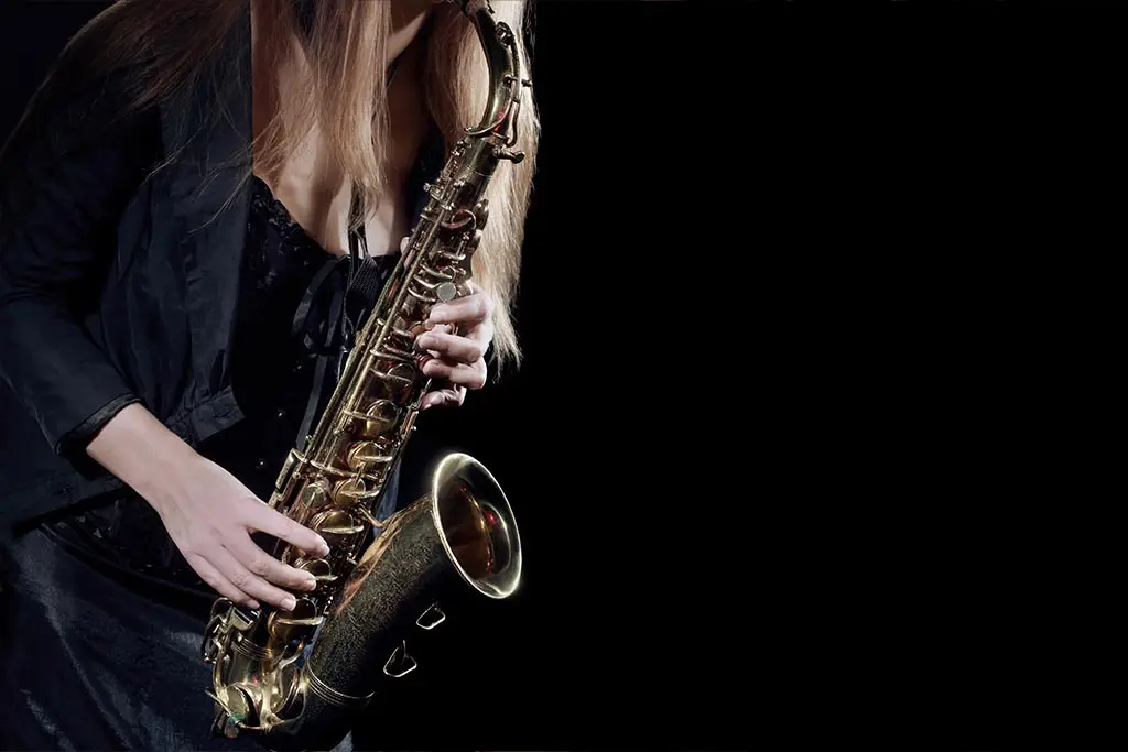 Woman playing saxophone