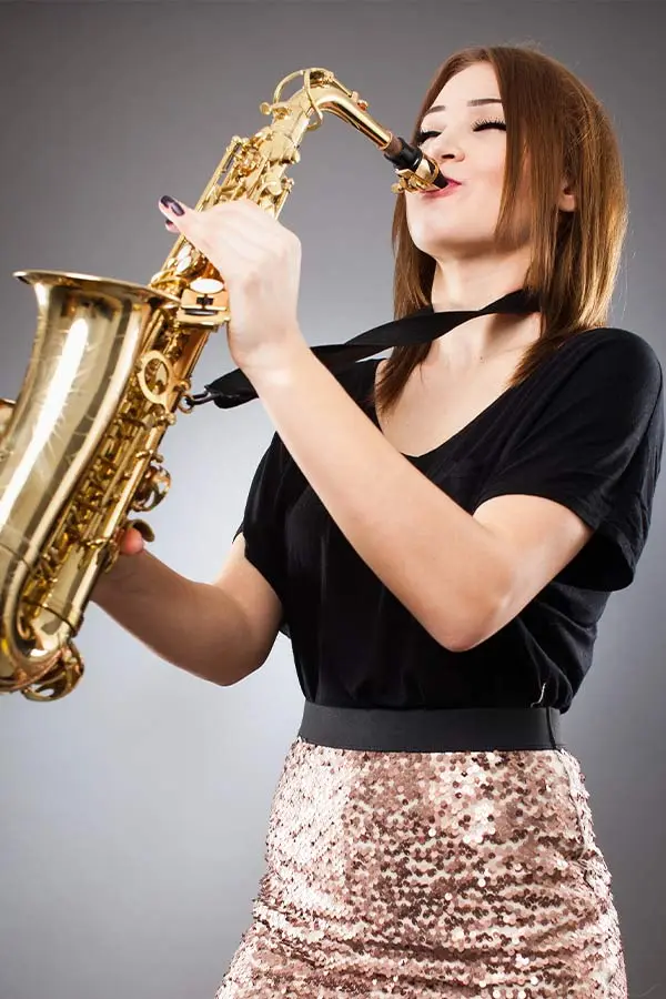Woman playing saxophone 