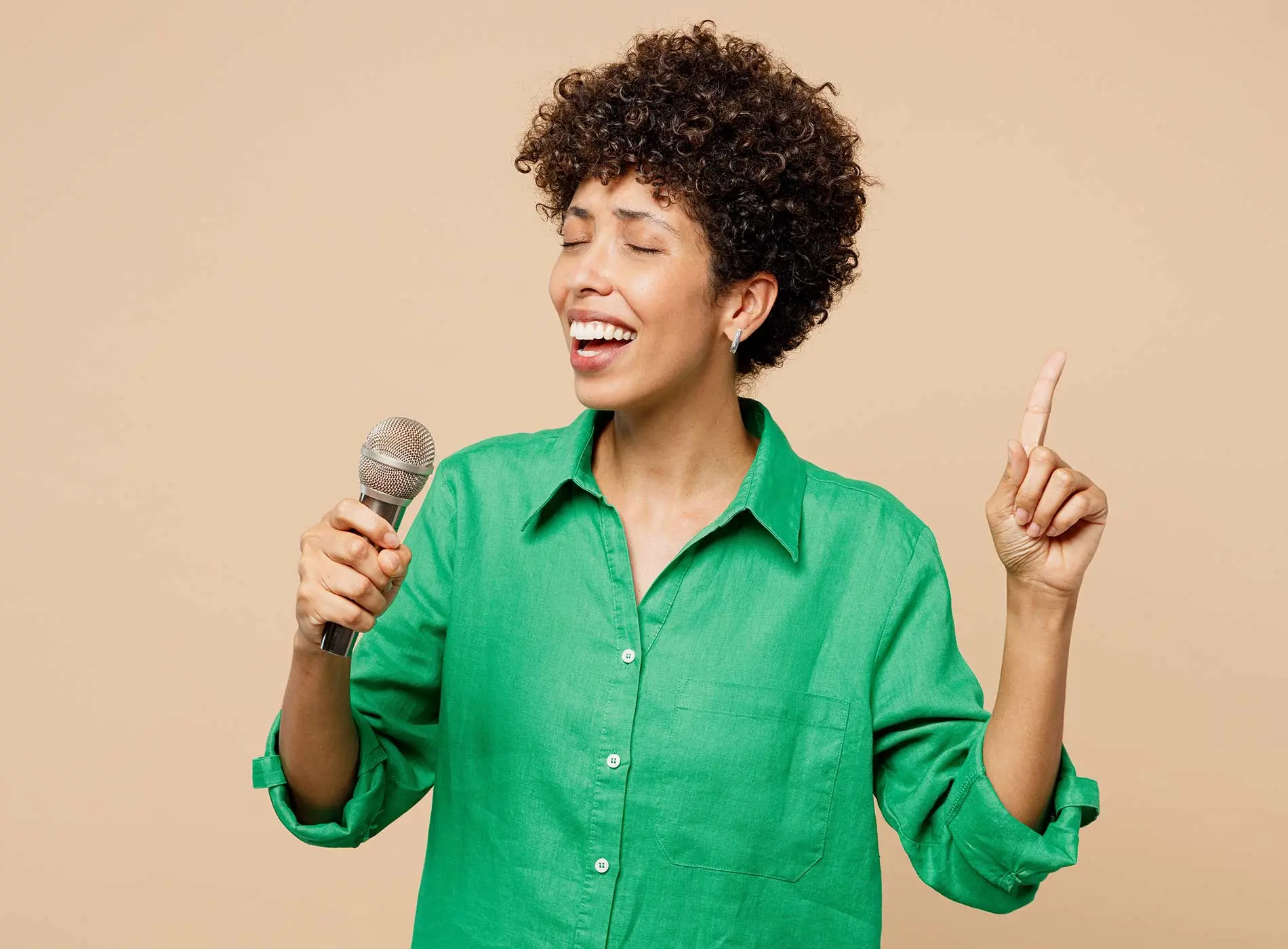 African American lady in green shirt singing