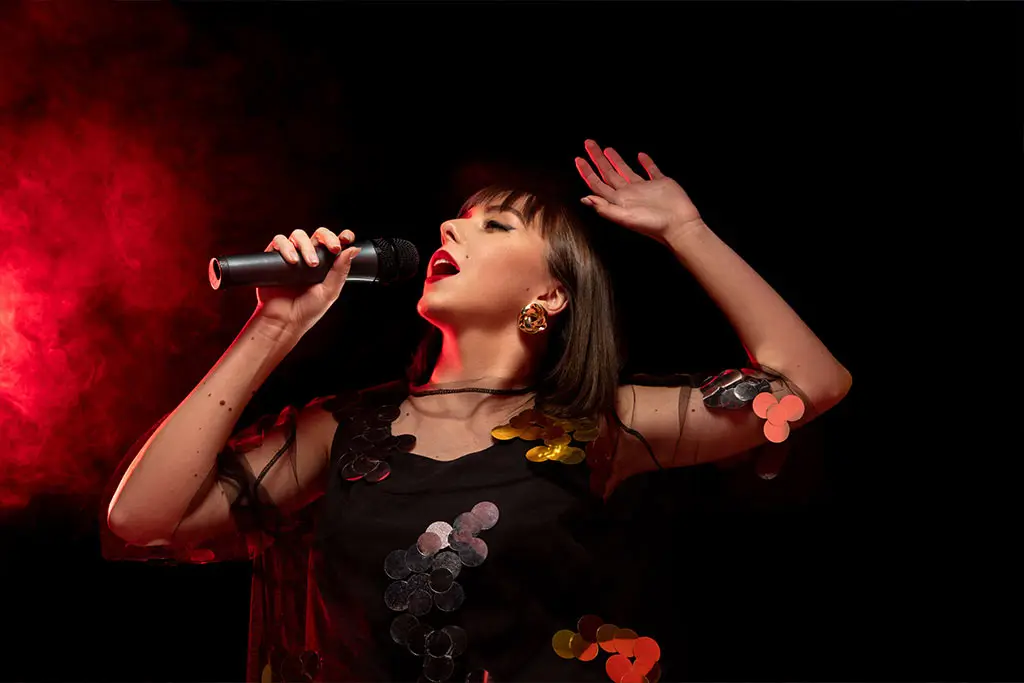 Woman singing passionately